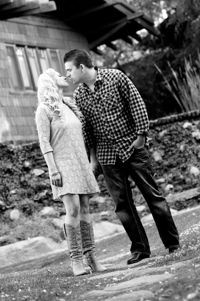 Young engaged couple kissing