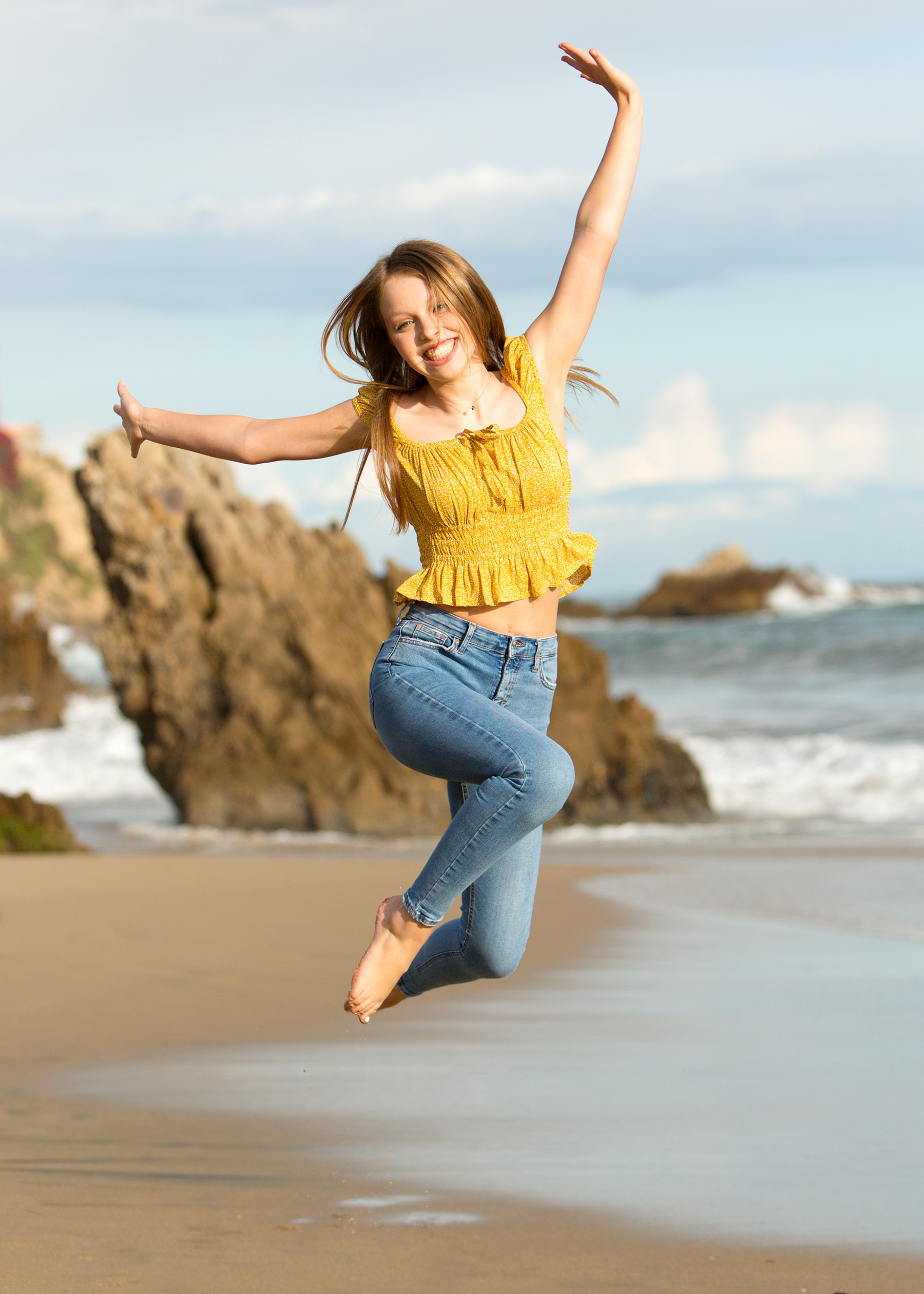 Girl Jumping at the beach