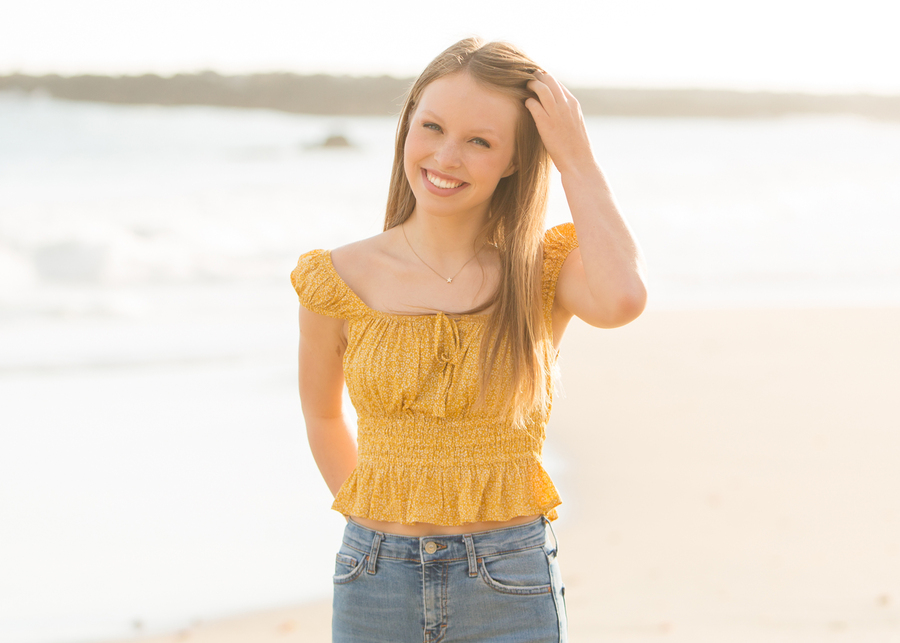 Girl smiling at the beach