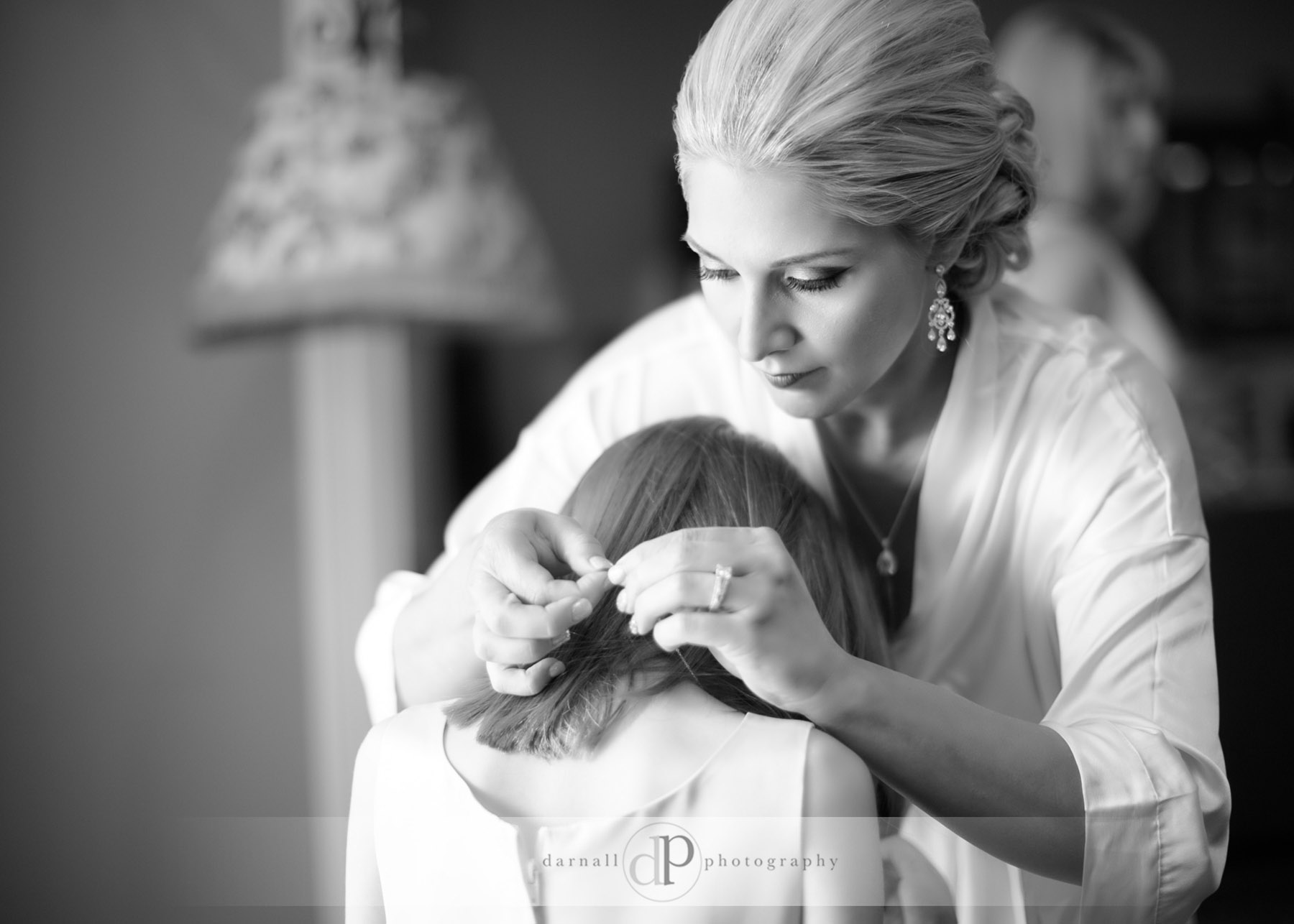 Bride and flower girl getting ready